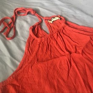 Cute orange sleeveless top